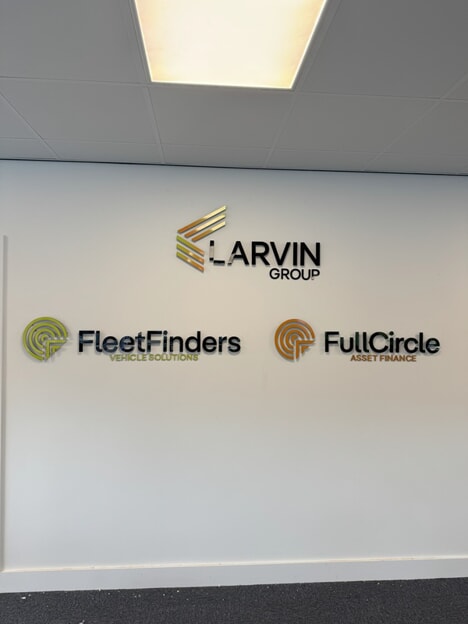 An image of the interior signage of the school showing Larvin group, Fleet Finders, and Full Circle.